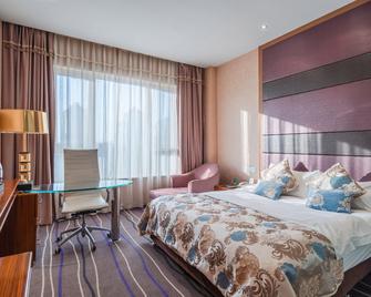 Xinfusheng Yihai International Hotel - Qingdao - Chambre