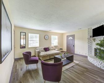 Indoor fireplace with patio and Pool Table - Beaumont - Living room