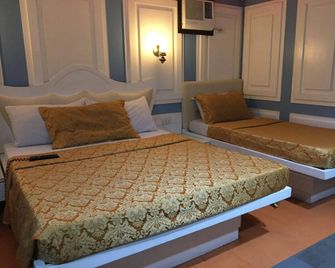 Icon Hotel Macapagal - باساي ستي - غرفة نوم