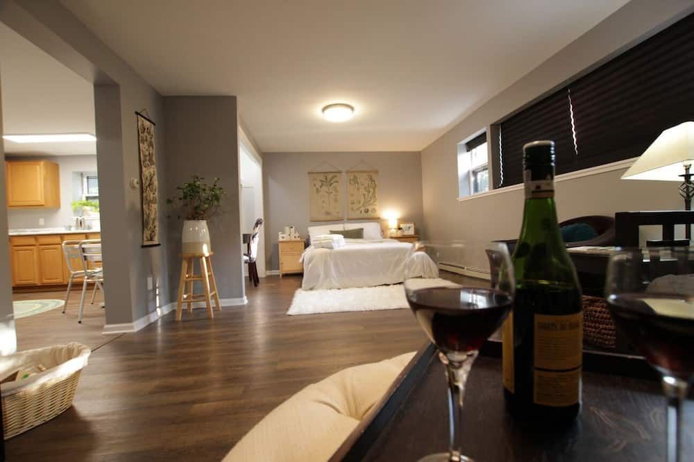 Bedroom view of Sunny Jumbo Studio in the Heart of Oak Park