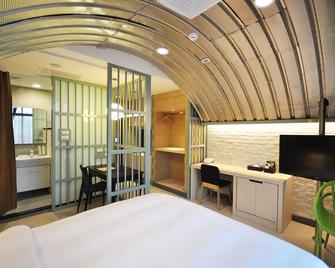823 Tourist Hotel - Jinhu Township - Bedroom