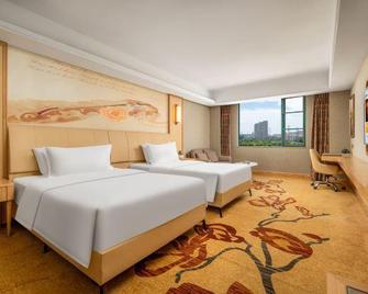 Yigu International Hotel - Ксіанфан - Спальня