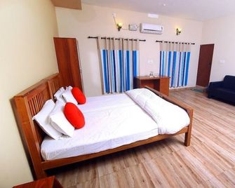 Sea Shell Haris Beach Home - Kannur - Bedroom