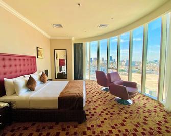 Kingsgate Hotel Doha by Millennium Hotels - Doha - Bedroom