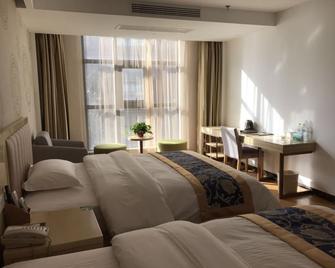 Greentree Inn Suqian Sucheng Area Weishan Lake Road Hotel - Suqian - Bedroom