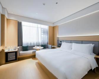 Glory Vogue Hotel - Chengdu - Bedroom