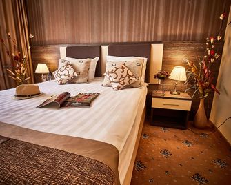 Hotel Sinaia - סינאיה - חדר שינה