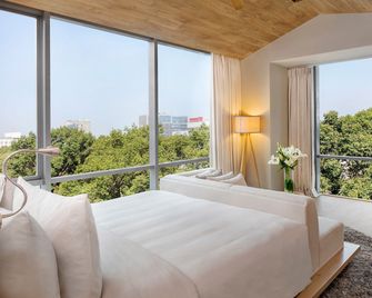 Fusion Suites Saigon - הו צ'י מין סיטי - חדר שינה