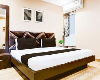 Collection O Kampoo Tiraha Road - Gwalior - Slaapkamer