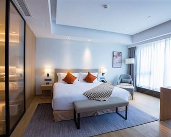 Shama Serviced Apartments Zijingang Hangzhou - Hangzhou - Schlafzimmer