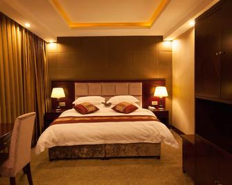 Maoxian International Hotel - Deyang - Bedroom