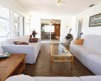 Private Tropical Waterfront Sanctuary w pool, hot tub & an island! Pet Friendly - New Port Richey - Living room