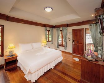 Long Bay Resort - Ko Pha Ngan - חדר שינה