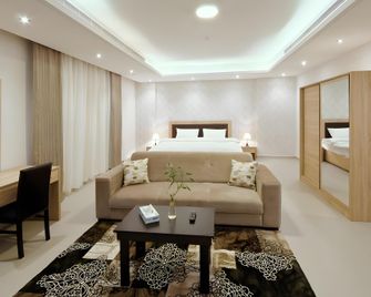Oasis Rise Hotel Apartments - Jeddah - Living room