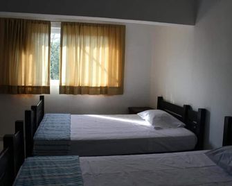 هوتل كالي 8 - توكستلا جوتيريز - غرفة نوم