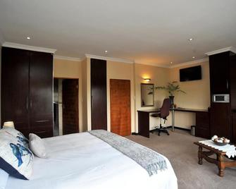 Sunset Manor Guest House - Potchefstroom - Camera da letto