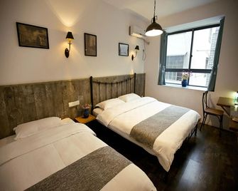 Zhangjiajie Mini Inn - Zhangjiajie - Habitación