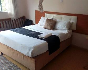 Sleepway Cottages - Nakuru - Schlafzimmer