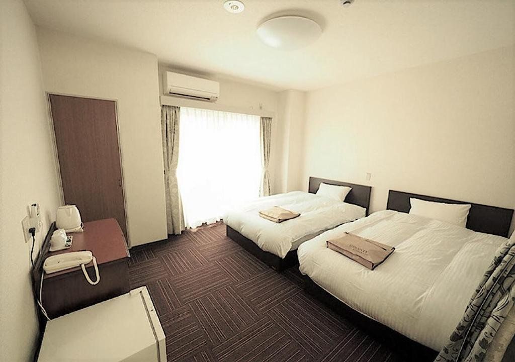 Business Hotel Urbanty Nishikujo - أوساكا - غرفة نوم