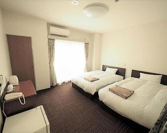 Business Hotel Urbanty Nishikujo - Osaka - Bedroom