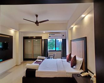 Hotel Ashwin Igatpuri, Pure Veg & Jain Food - Igatpuri - Спальня