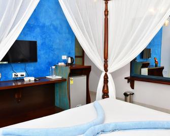Naga Cottages - Morjim