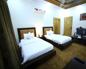 Green Line Motel Islamabad - Islamabad - Camera da letto