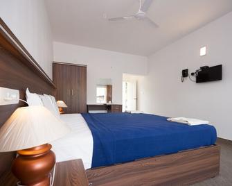 God's Own Villa - Kovalam - Habitación