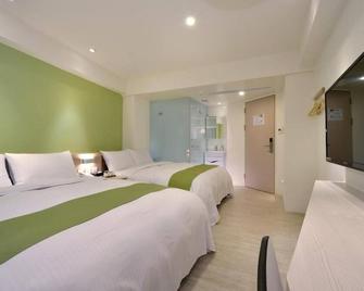 Green Hotel - Fengjia - טאיצ'ונג - חדר שינה