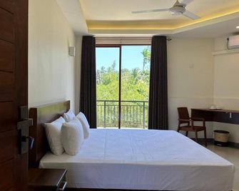 Fortwill City Hotel - Galle - Habitación