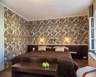 Hotel Peregrin - Český Krumlov - Slaapkamer