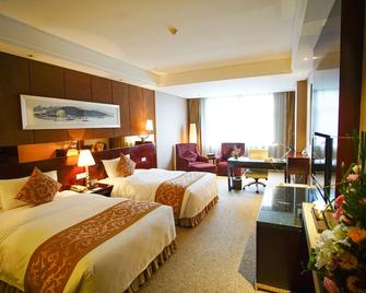 Grand Soluxe Hotel Xi'an - Сіань - Спальня