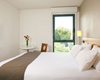 Sejours & Affaires Orleans Jeanne D'Arc - אורליאן - חדר שינה