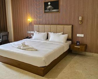 Prosland Hotels - Tirur - Bedroom