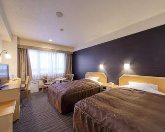 Okayama City Hotel Kuwatacho - Okayama - Bedroom
