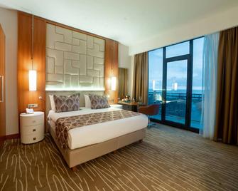Grand Bellagio Batumi Convention & Casino Hotel - Batumi - Ložnice