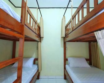 Pondok Mesari House Ubud - Hostel - Ubud - Bedroom