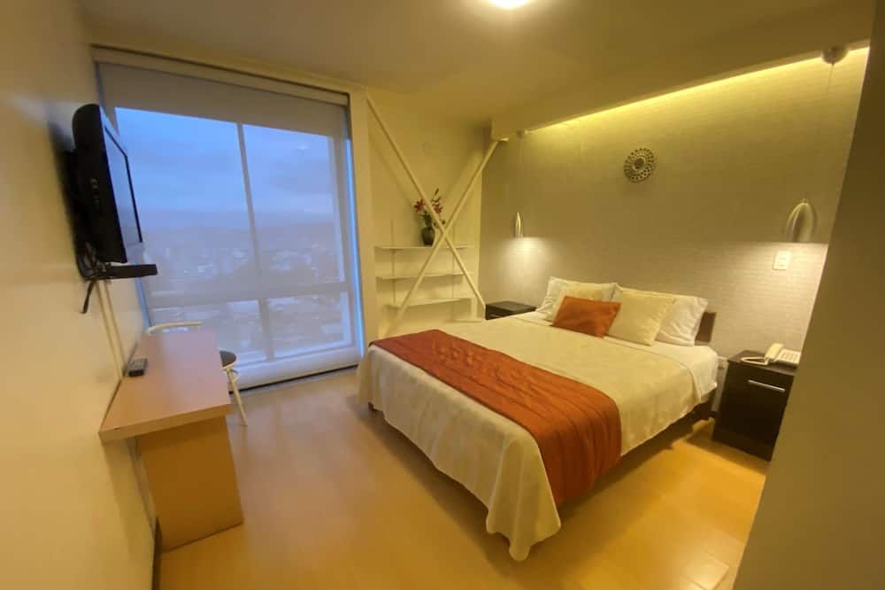 سويتس متروبولي - كويتو - غرفة نوم