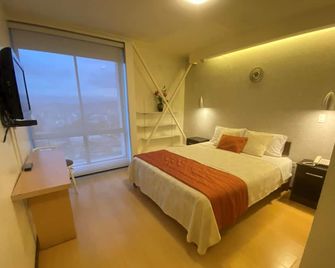 Suites Metropoli - Quito - Chambre