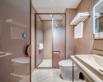 Hanting Hotel Harbin Xidazhi Street Gongda - Harbin - Bedroom