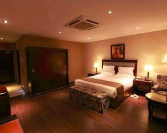 The Greenwood Hotel - Golāghāt - Bedroom