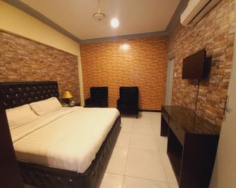 Travel Inn islamabad - Islamabad - Schlafzimmer