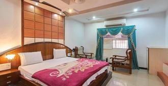Hotel Rahul - נגפור - חדר שינה