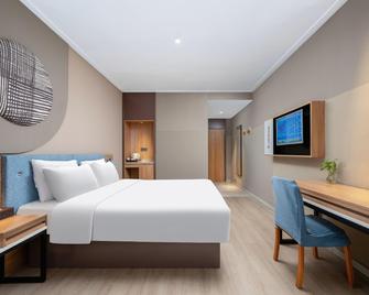 Home Inn (Linyi Binhe Avenue) - Linyi - Bedroom