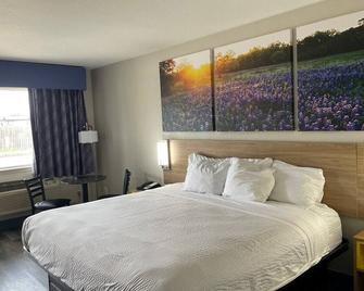 دايز إن باي ويندام سان أنطونيو سوث إيست/فروست بانك سنتر - سان انطونيو - غرفة نوم