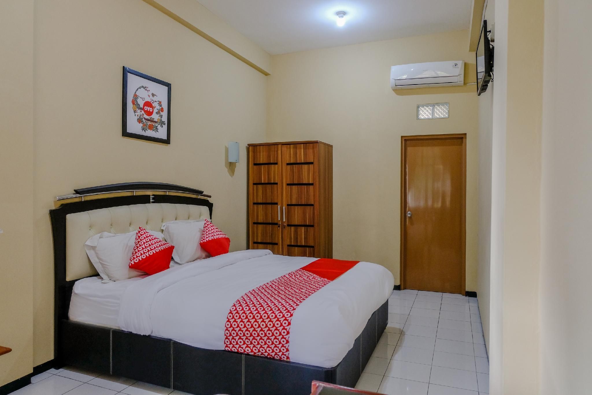 OYO 1342 Uniga Malang Family Residence - מאלאנג - חדר שינה