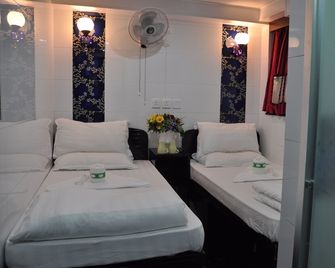 New Guangzhou Guest House - Hong Kong - חדר שינה