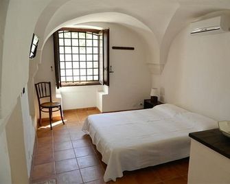 Antica Masseria Il Purgatorio - Fasano - Schlafzimmer