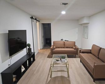 New Listing. Best Location. Luxury Basement Suite Experience - Lethbridge - Living room