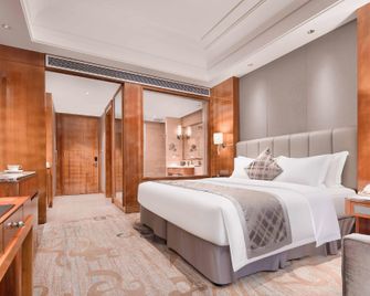 Changsha Jiaxing Inn - צ'נגשה - חדר שינה